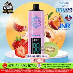 A pink JNR Shisha Classic Baghdadi vape pen displayed on a white pedestal, surrounded by fruit graphics (strawberries, melon, peach) and promotional text overlays.