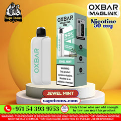 Oxbar Maglink PDD vape device in Jewel Mint flavor shown next to its retail packaging box, displayed on a white pedestal with promotional text overlays.