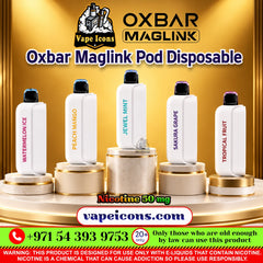 OXBAR MAGLINK 50000 Puffs disposable vape pods by Vape Icons, showing five white vape pods on gold pedestals against a gold background: Watermelon Ice, Peach Mango, Jewel Mint, Sakura Grape, and Tropical Fruit.
